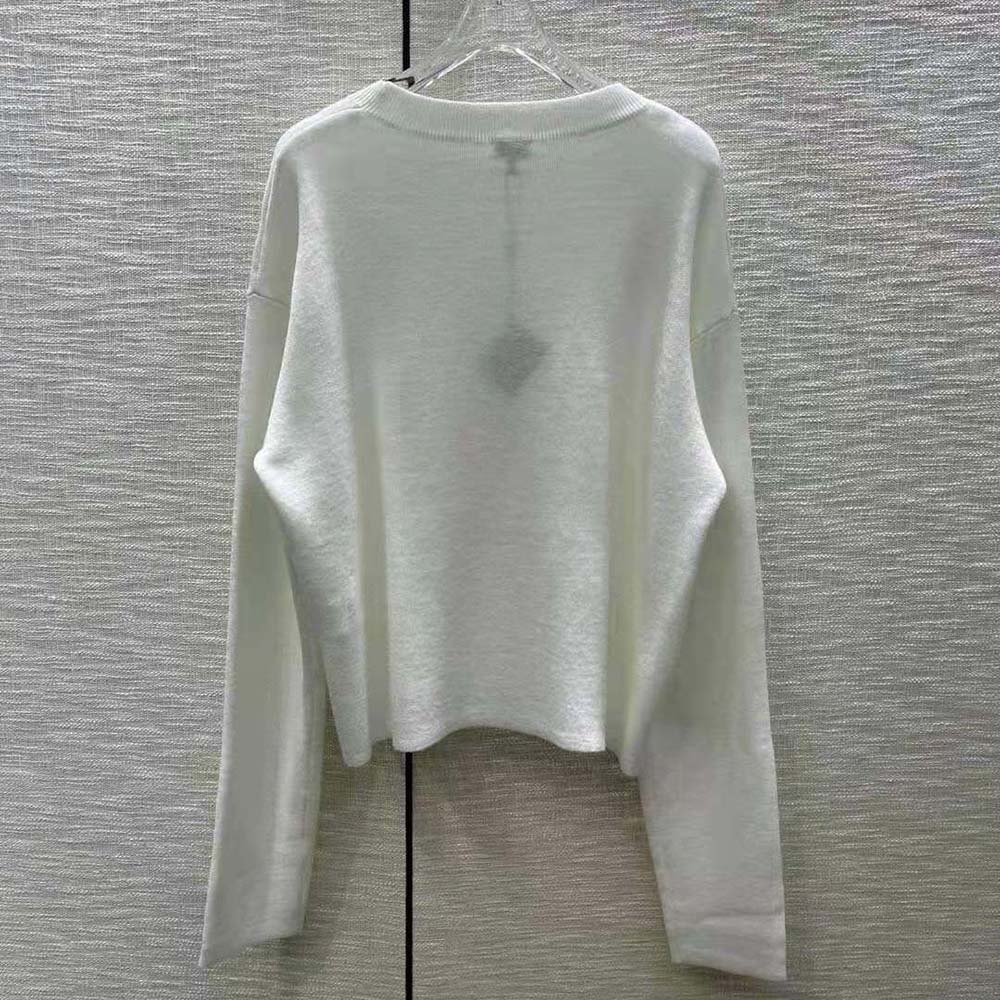 Side profile showing relaxed fit of Loewe Women Anagram Sweater Wool-White