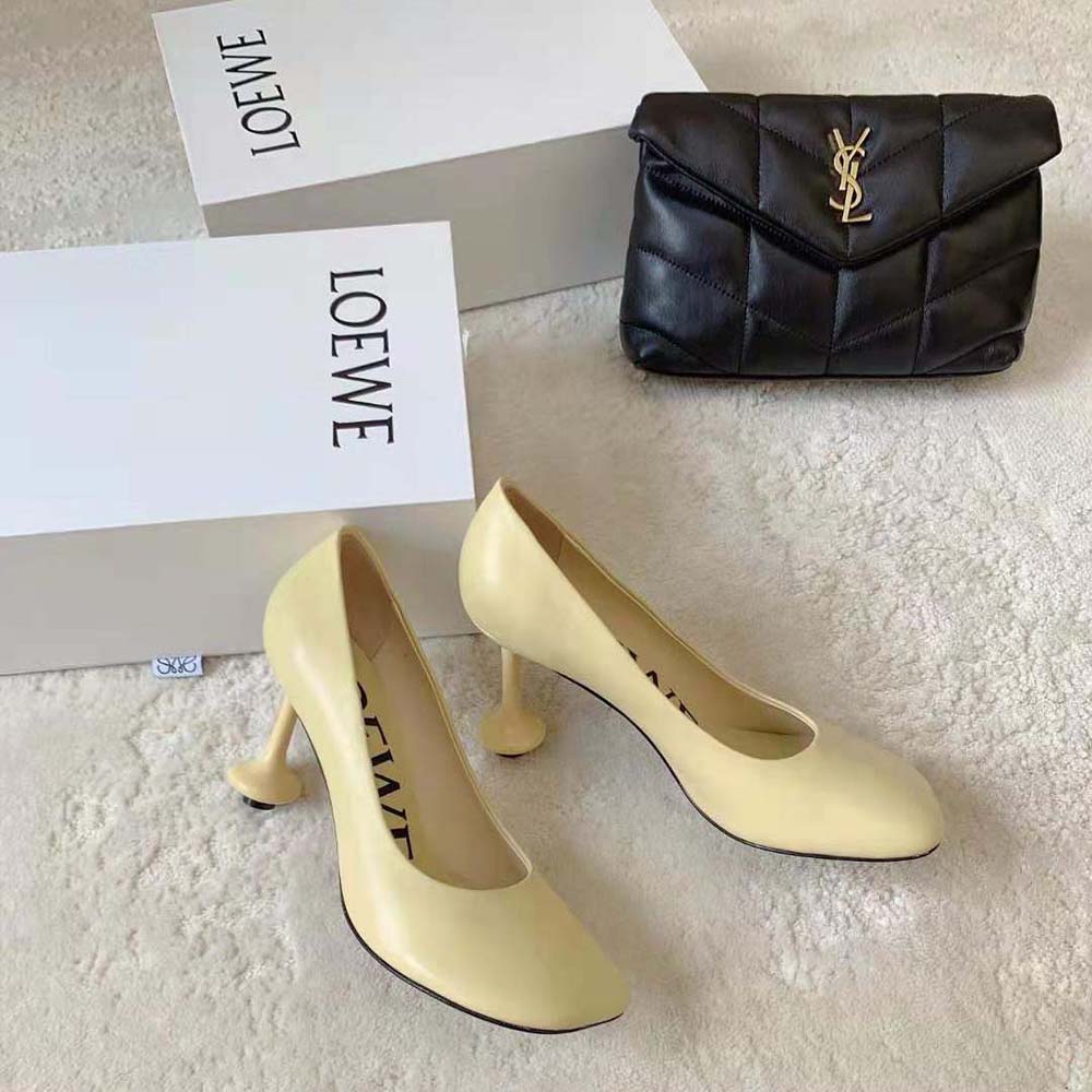 Top-down angle of Loewe Women Toy Pump in vibrant yellow leather