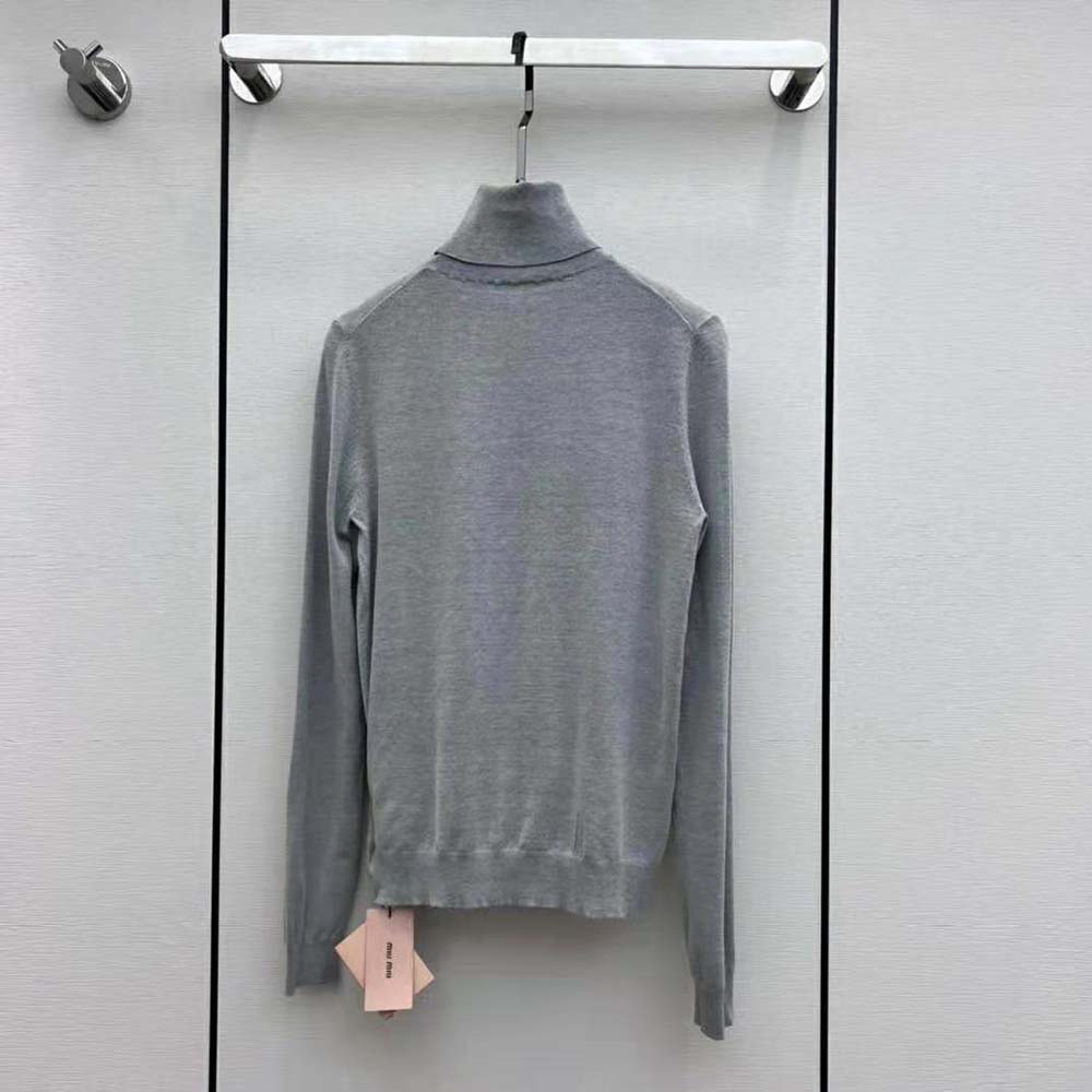 Side angle showing relaxed fit of Miu Miu Women Cashmere and Silk Sweater