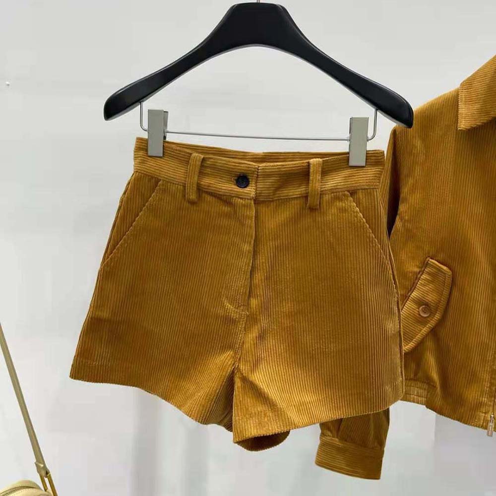 Close-up detail of embroidered logo on Miu Miu Women Corduroy Shorts brown