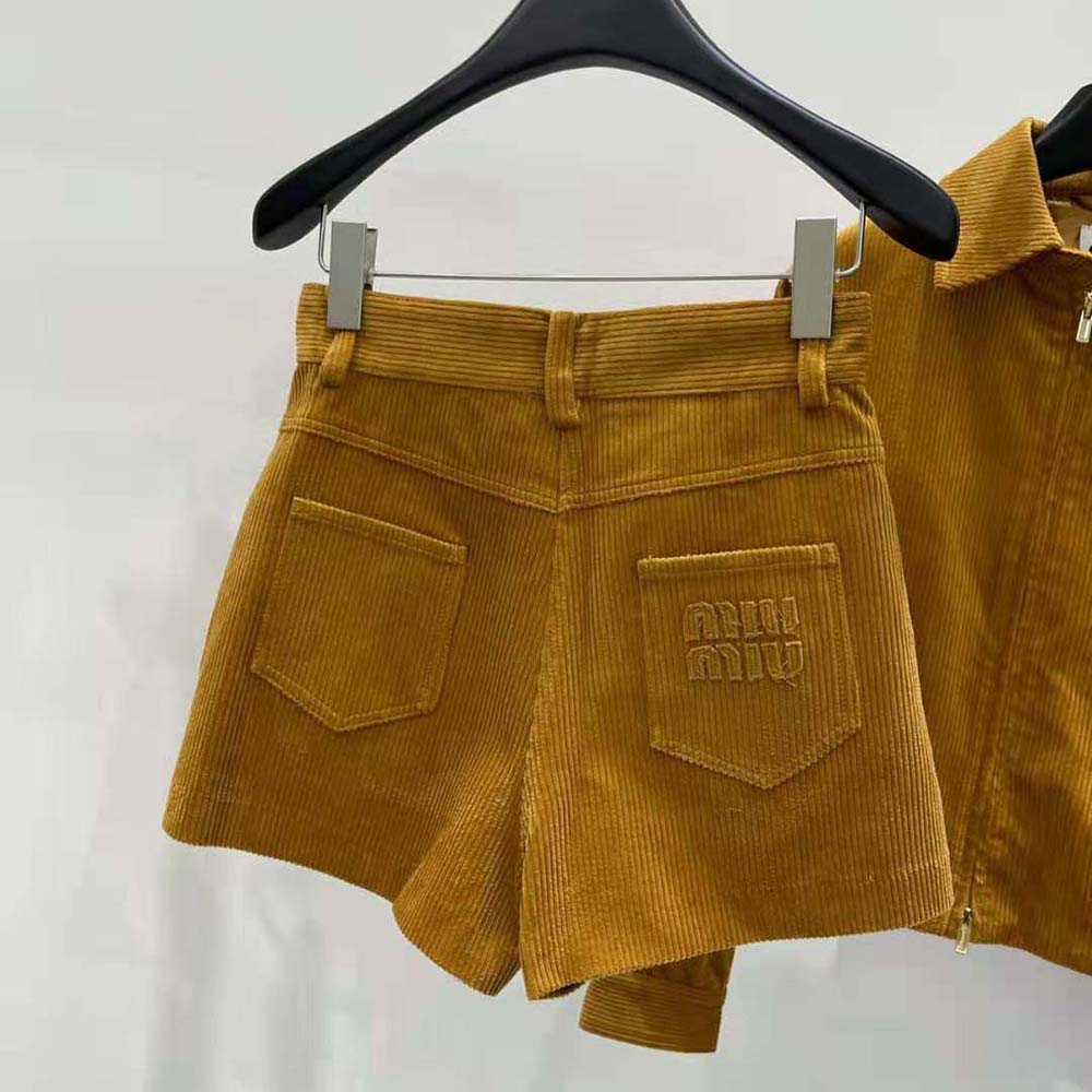 Side profile showing tailored silhouette of Miu Miu Women Corduroy Shorts