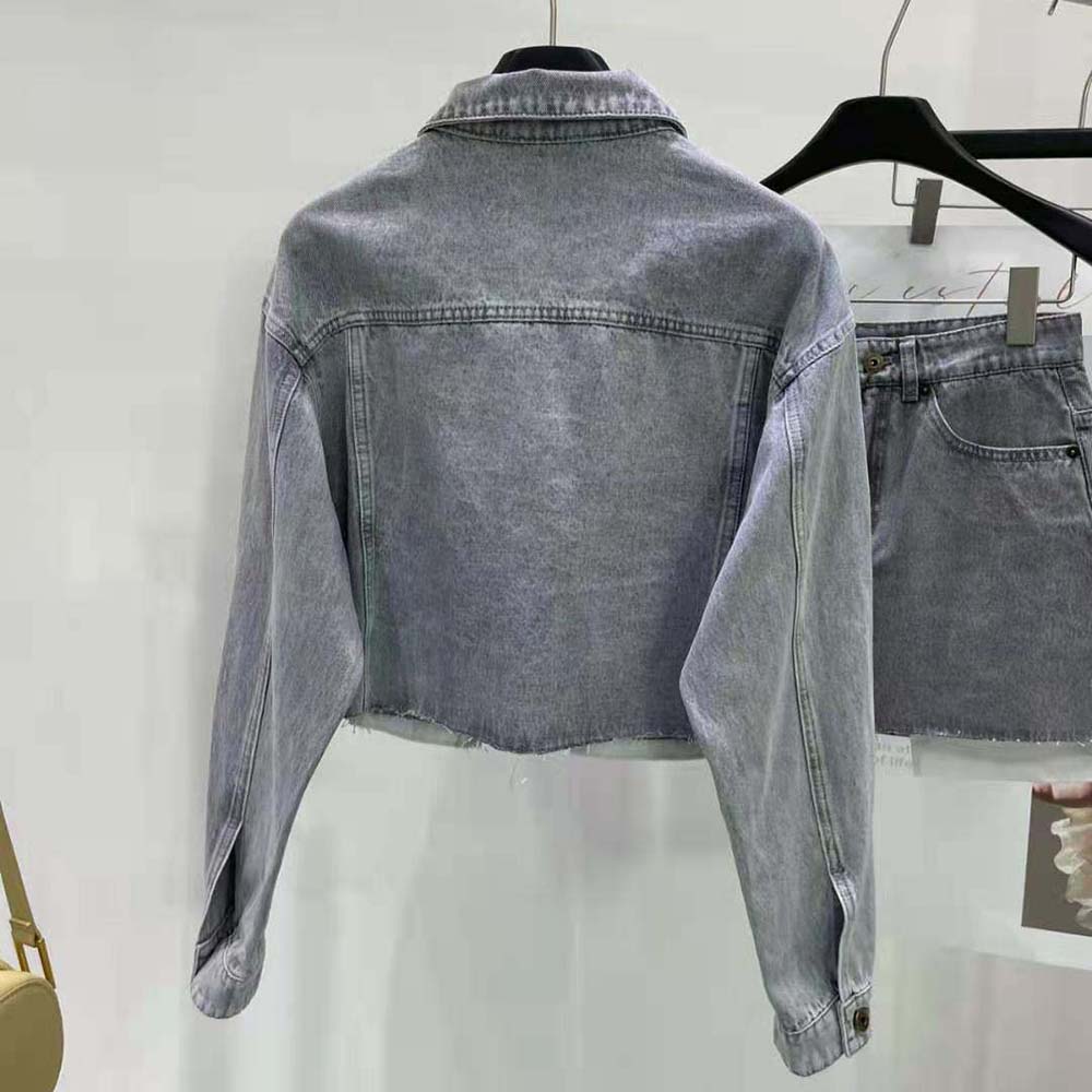 Side angle showing silver-tone hardware on Miu Miu Women Denim Blouson Jacket
