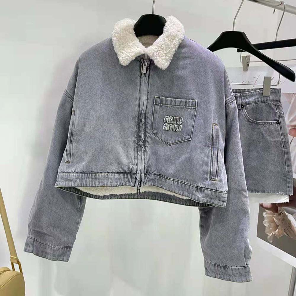 Close-up of silver denim and embroidered logo on Miu Miu Women Jacket