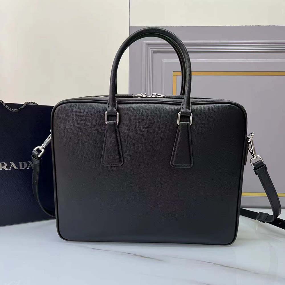 Side angle showing structured silhouette of Prada Men Saffiano Leather Work Bag-Black