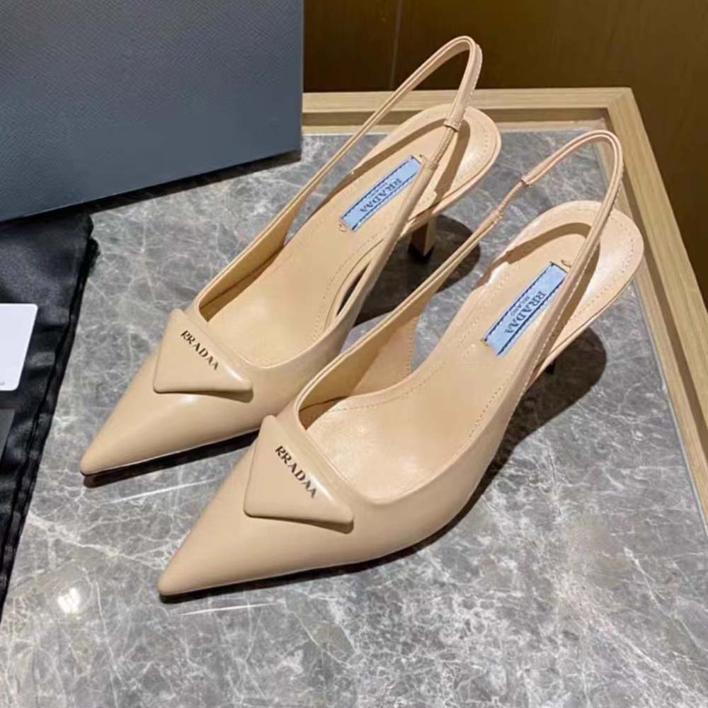 Front angle showing open toe and ankle strap of Prada leather sandals