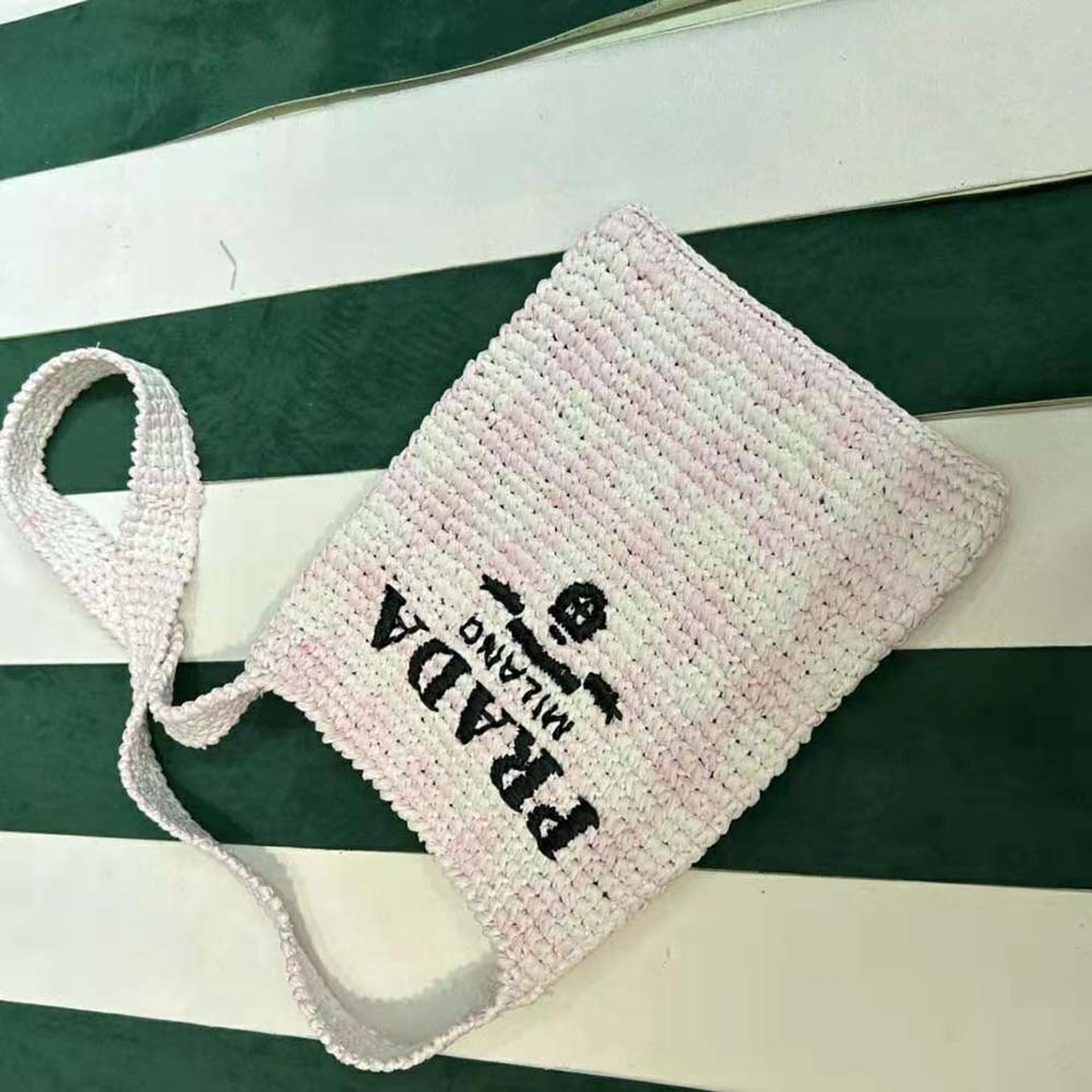 Side angle showing silver hardware and crochet texture on Prada Women Crochet Bag