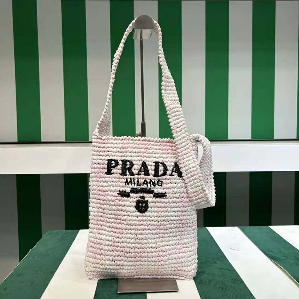 Close-up of embroidered lettering logo on Prada Women Crochet Bag pink
