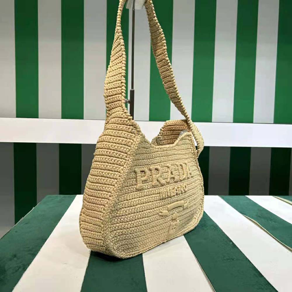 Side angle showing spacious interior of Prada Women Crochet Tote Bag Natural