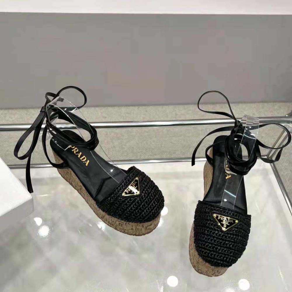 Top view of black crochet upper and wedge heel on Prada Women Crochet Wedge Sandals