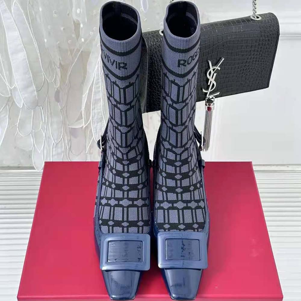 Close-up of lacquered buckle on Roger Vivier Belle Vivier Sock Ankle Boots