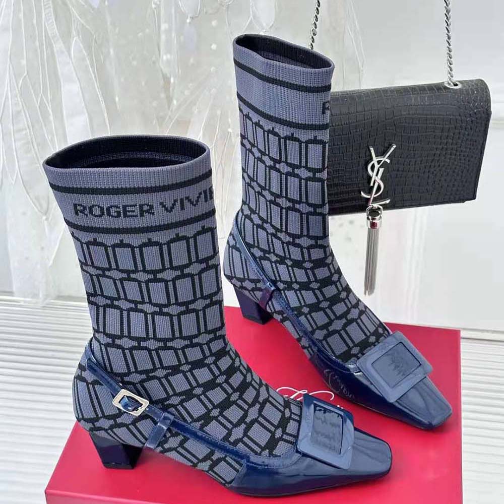Top angle showcasing patent leather texture on Roger Vivier Blue ankle boots