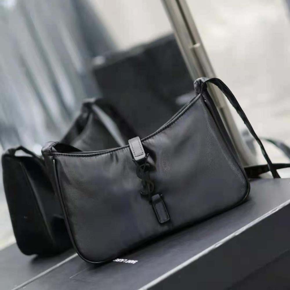 Side angle highlighting zipper and adjustable strap of Saint Laurent YSL crossbody bag