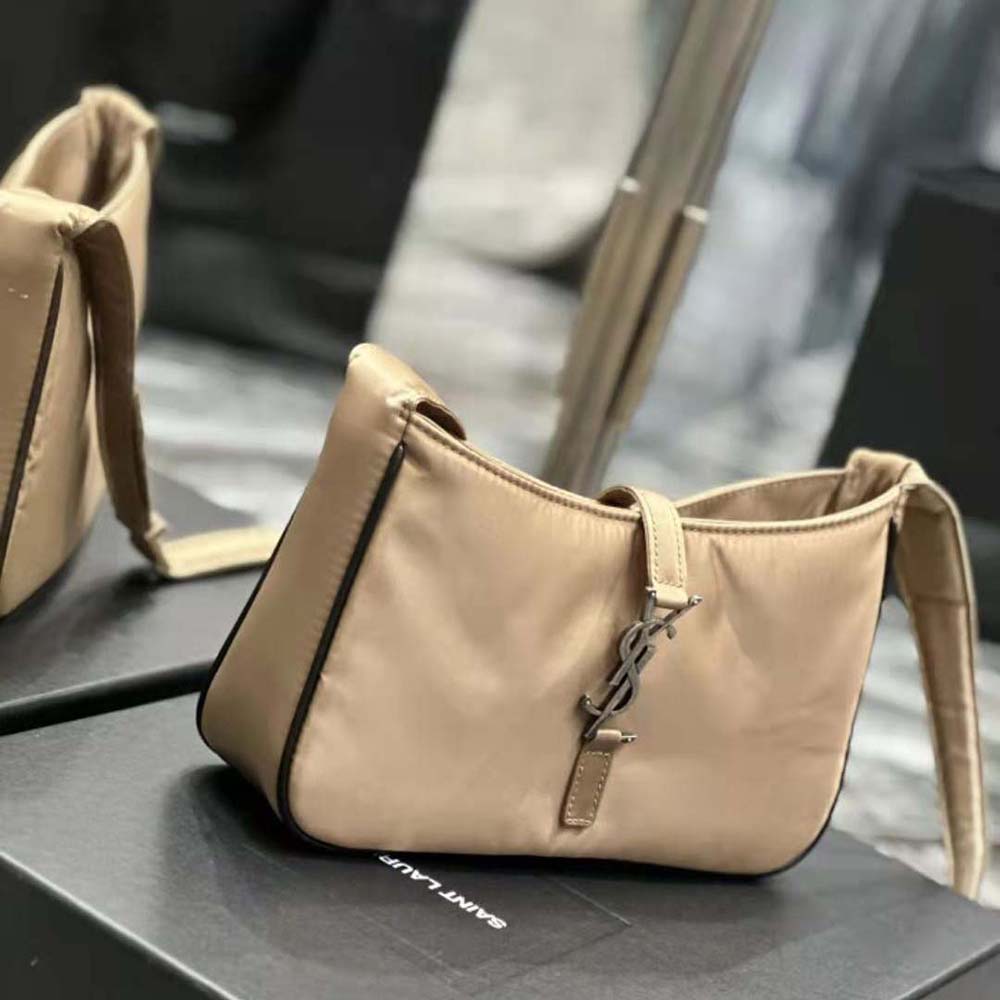 Side angle showing adjustable strap on Saint Laurent YSL crossbody bag