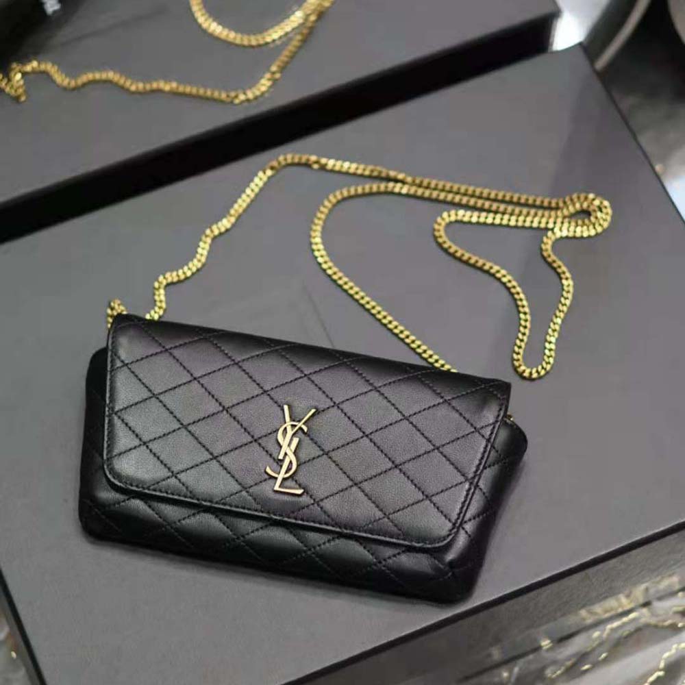 Close-up of gold YSL monogram hardware on Gaby Phone Holder bag