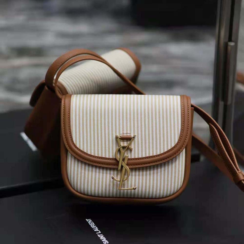 Close-up of gold YSL hardware on Kaia Small shoulder bag
