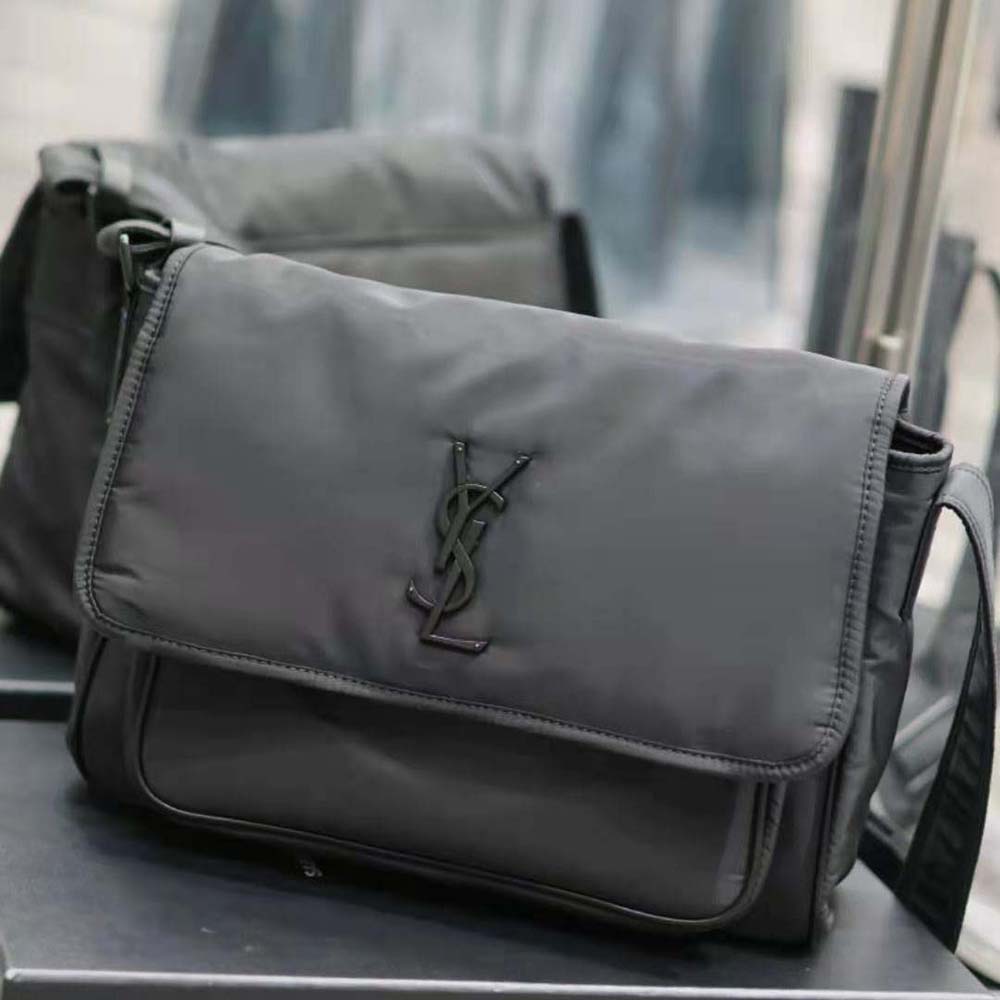 Side angle showing adjustable strap on Saint Laurent YSL Niki Messenger