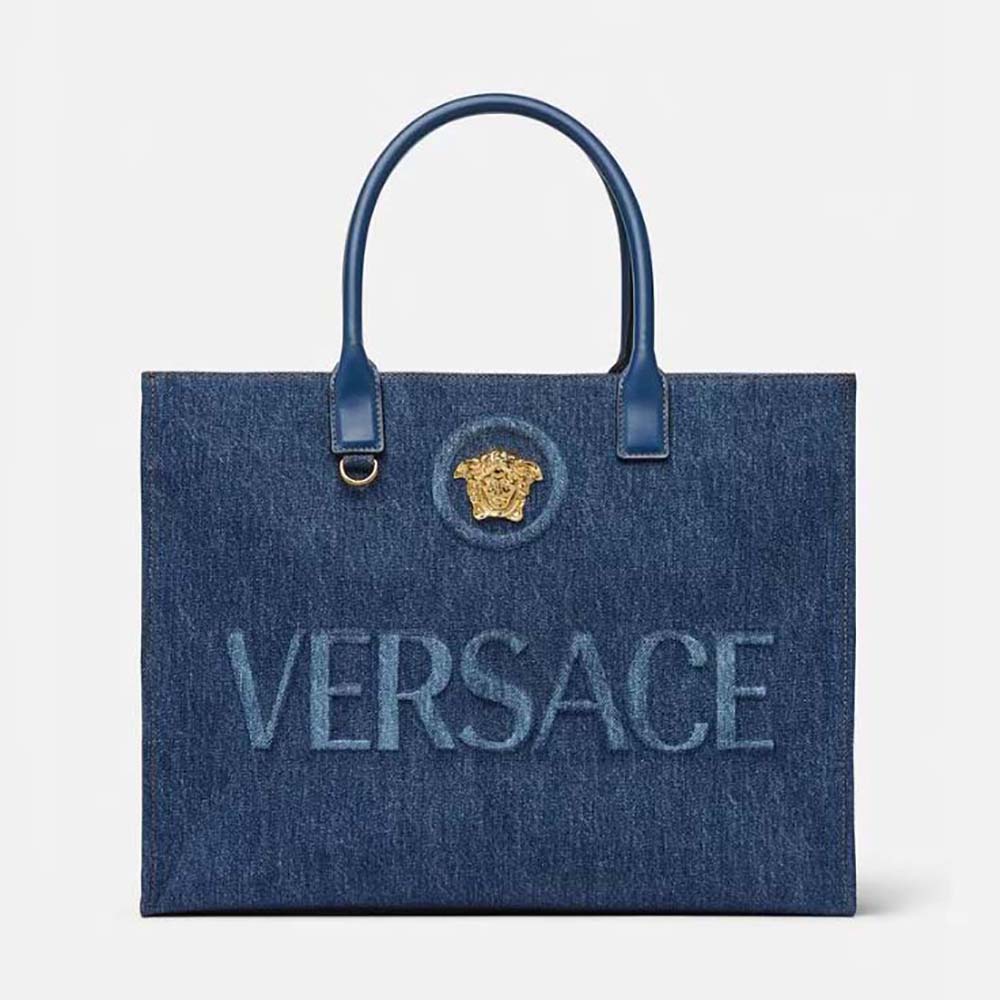 Front view of Versace Women La Medusa Denim Large Tote Bag-Blue with Medusa emblem