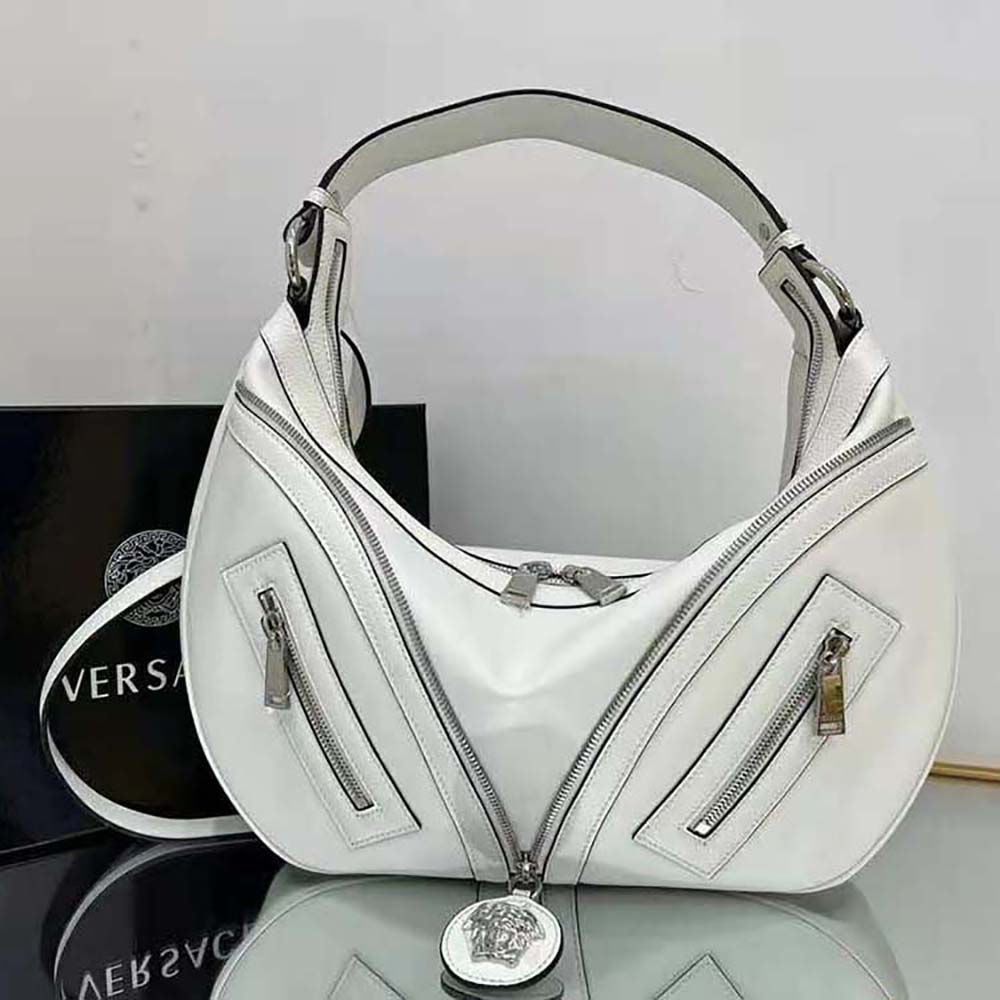 Side angle highlighting smooth leather texture of Versace Women Repeat Hobo Bag-White
