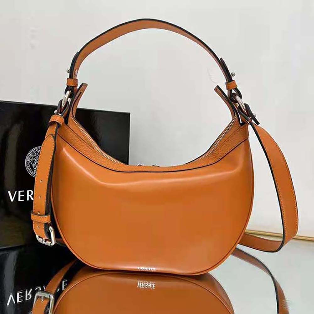 Side profile of compact Versace Women Repeat Small Hobo Bag-Orange