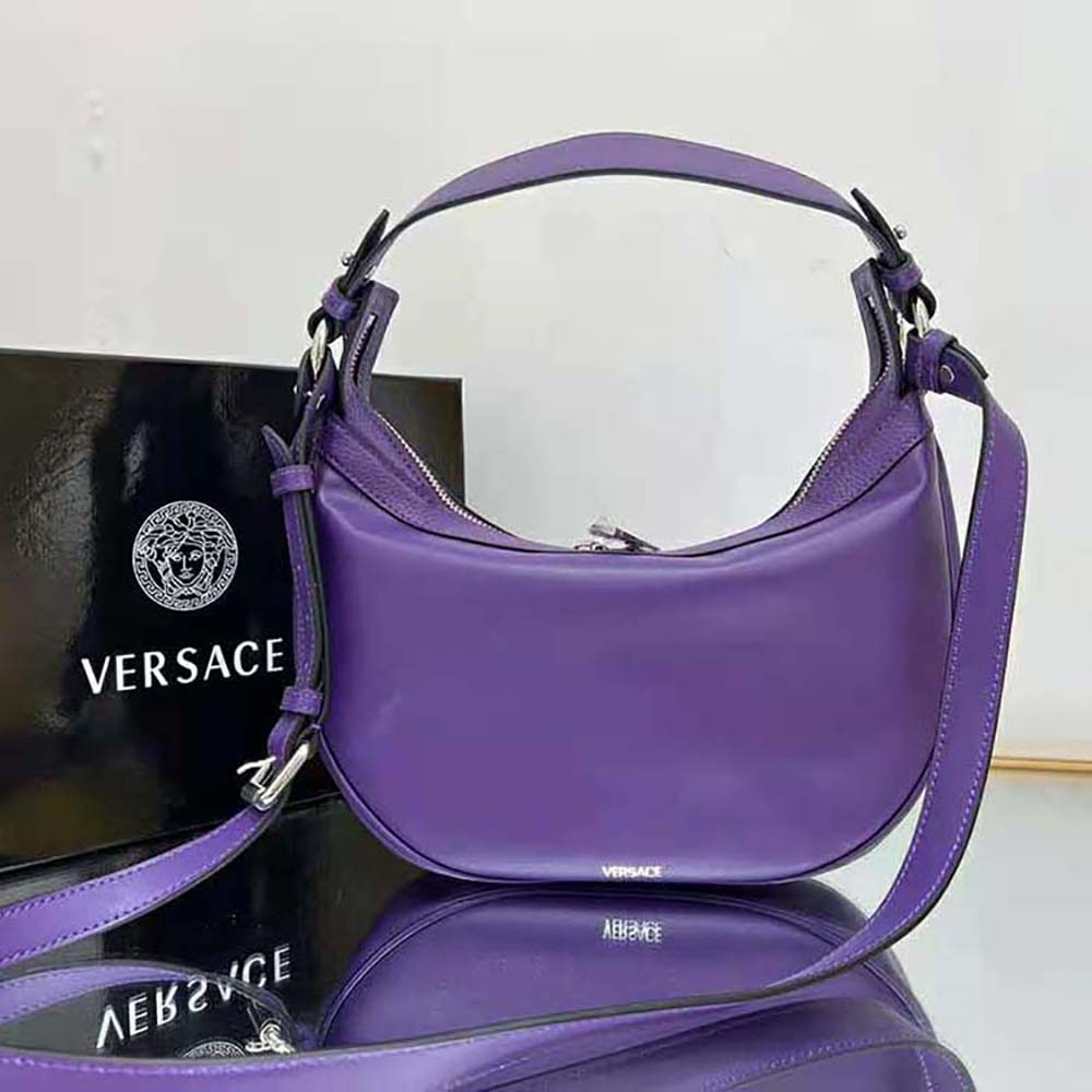 Side angle highlighting silhouette of Versace Women Repeat Small Hobo Bag-Purple