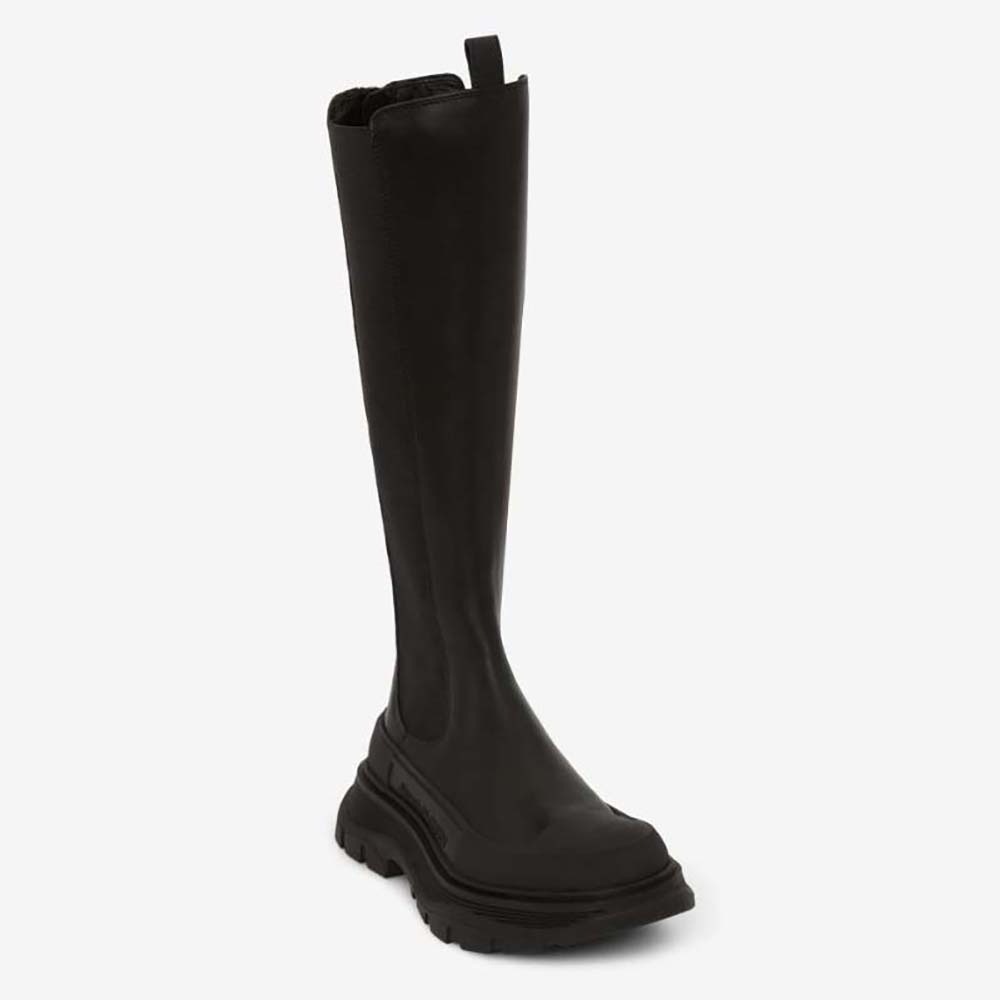 Side profile of Alexander Mcqueen Women Tread Slick Knee High Boot in Black