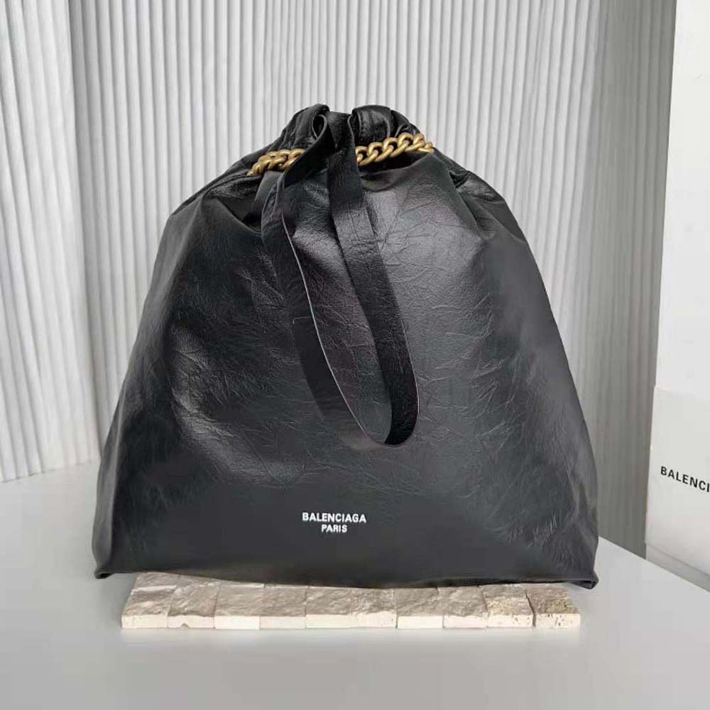 Close-up detail of silver-tone hardware on Balenciaga Women Crush Medium Tote Bag