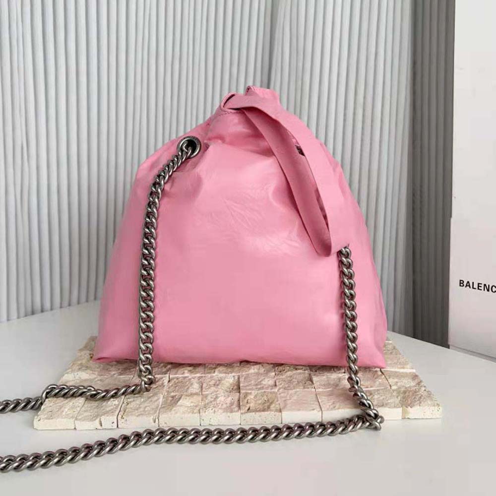 Side angle showing compact silhouette of Balenciaga Women Crush Small Tote Bag