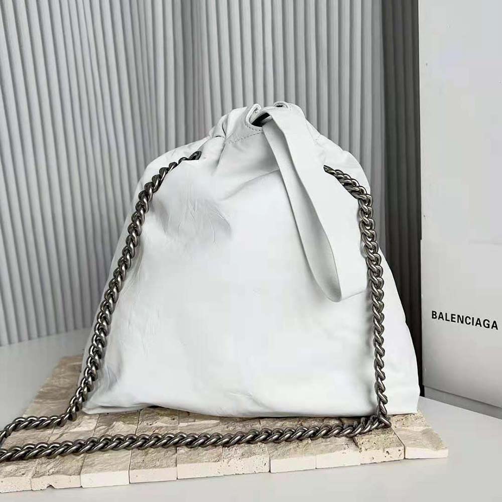 Side angle showing crushed leather texture of Balenciaga Women Crush Small Tote Bag