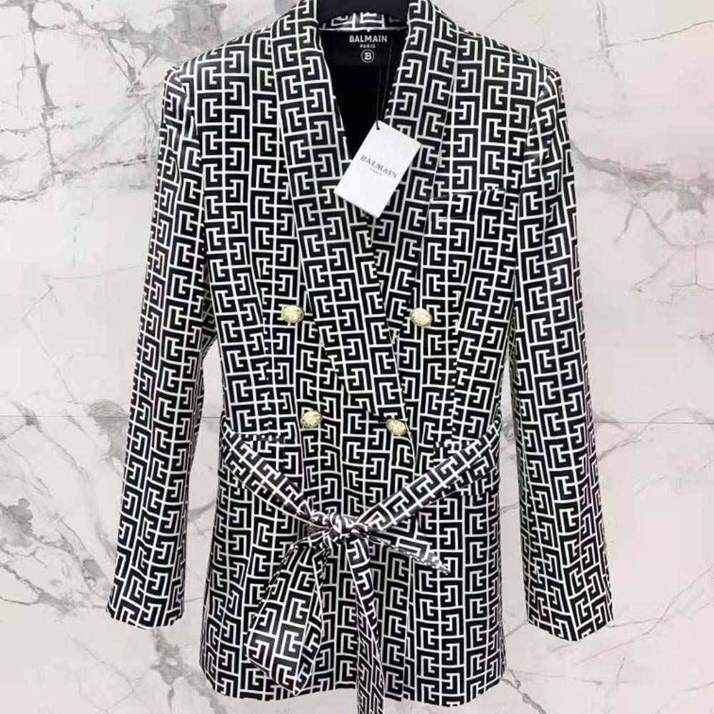 Close-up of shawl collar and metal buttons on Balmain Monogram Jacket