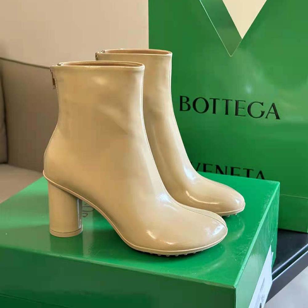 Top angled shot highlighting elastic side panel of Bottega Veneta Women Atomic Ankle Boot-Beige