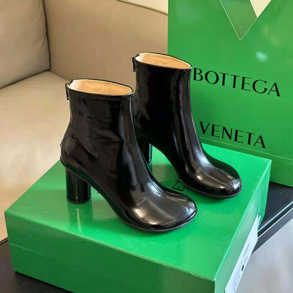 Close-up of black calfskin leather and zipper on Bottega Veneta Atomic Boot