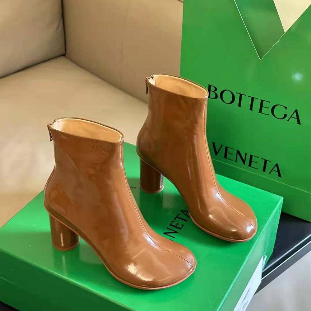Back angle highlighting silhouette and heel of Bottega Veneta Women Atomic Ankle Boot-Brown