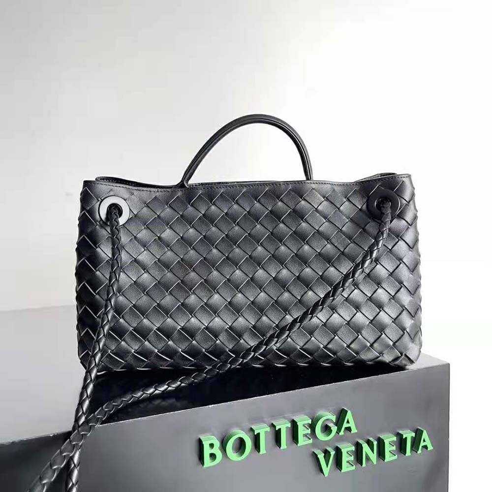Side profile showing silhouette and hardware of Bottega Veneta Women Small East/West Andiamo-Black