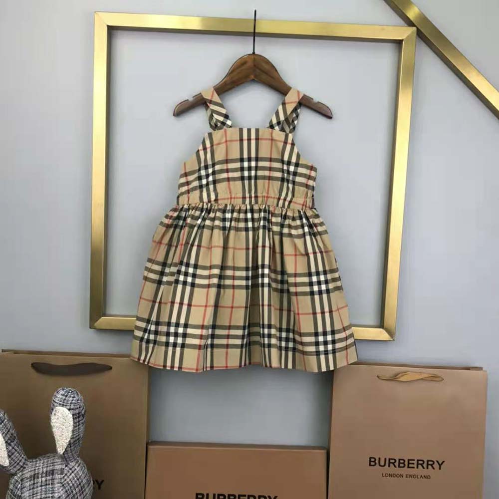 Side angle showing fit and stretch of Burberry Girls’ vintage top