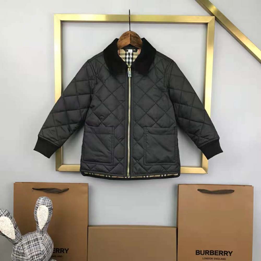 Side angle showing silhouette of Burberry Kids’ Corduroy Collar Quilted Jacket