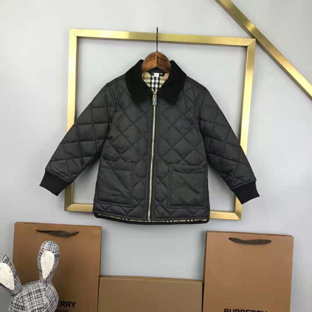 Close-up of corduroy collar on Burberry Kids’ Diamond Quilted Jacket