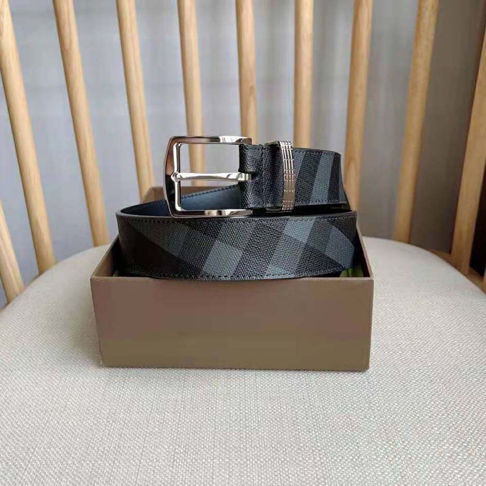 Close-up of Burberry check fabric and black leather texture belt