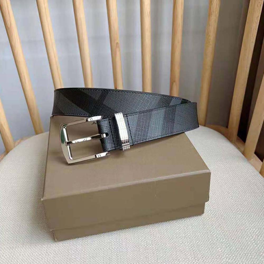 Side angle showing polished metal hardware on Burberry Men Check and Leather Belt-Navy