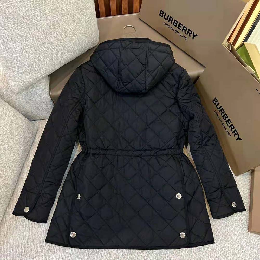 Side profile showing silhouette of Burberry Women Diamond Quilted Nylon Jacket-Black