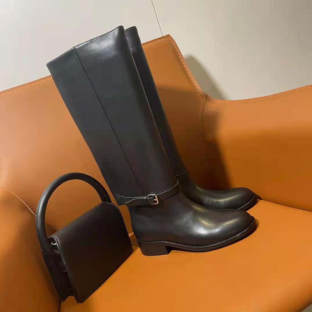Close-up of embossed ankle strap detail on Burberry Women Leather Boots