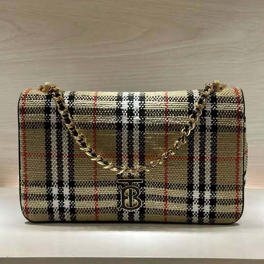 Close-up of polished gold hardware on Burberry Women Medium Lola Bag
