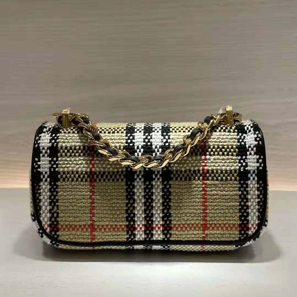 Side angle showing silhouette of Burberry Women Mini Lola Bag