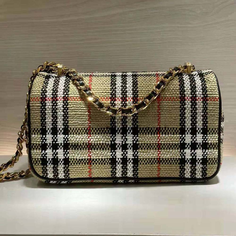 Side angle showing compact shape of Burberry Women Small Lola Bag