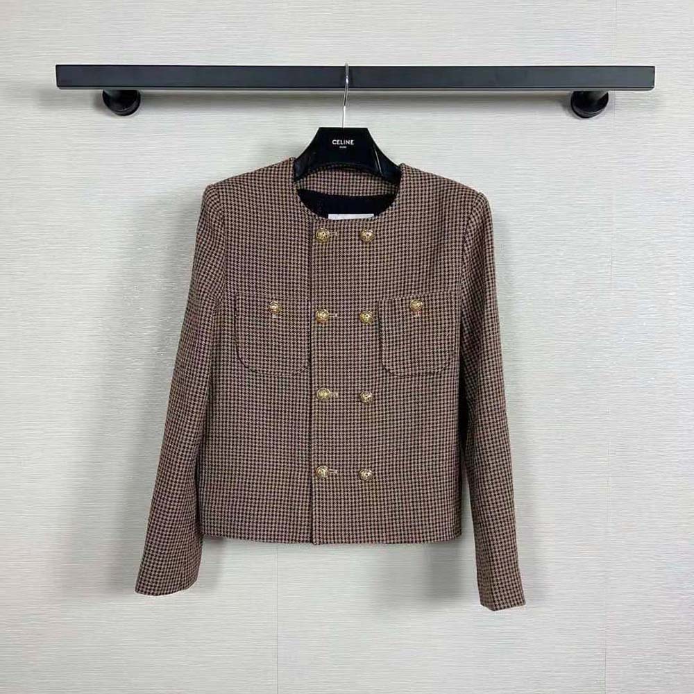 Close-up detail of button and fabric houndstooth pattern on Celine jacket