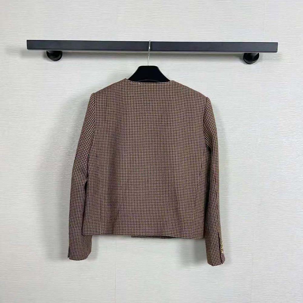 Side profile showing tailored silhouette of Celine Women Chelsea Jacket brown wool