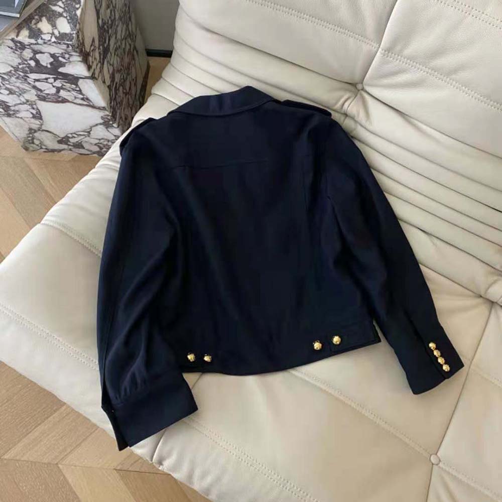 Side angle showcasing cropped silhouette of Celine Women's navy wool jacket