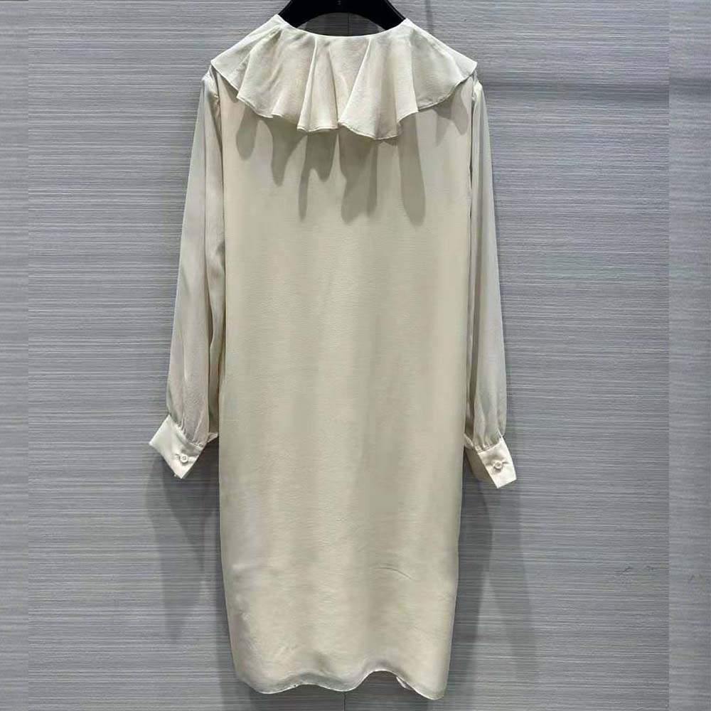 Side profile showing silhouette of Celine Women Jabot Dress in white