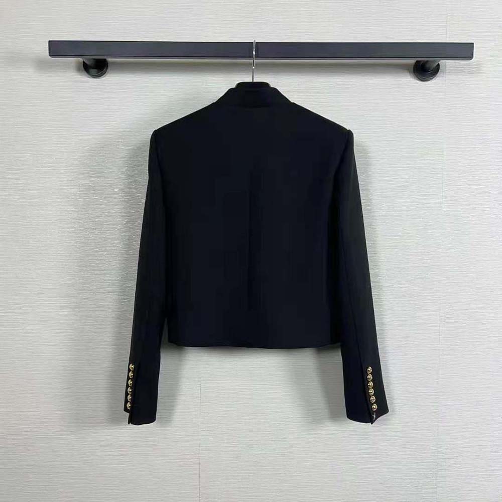 Side angle showing tailored silhouette of Celine Women Military Jacket in Wool Cloth