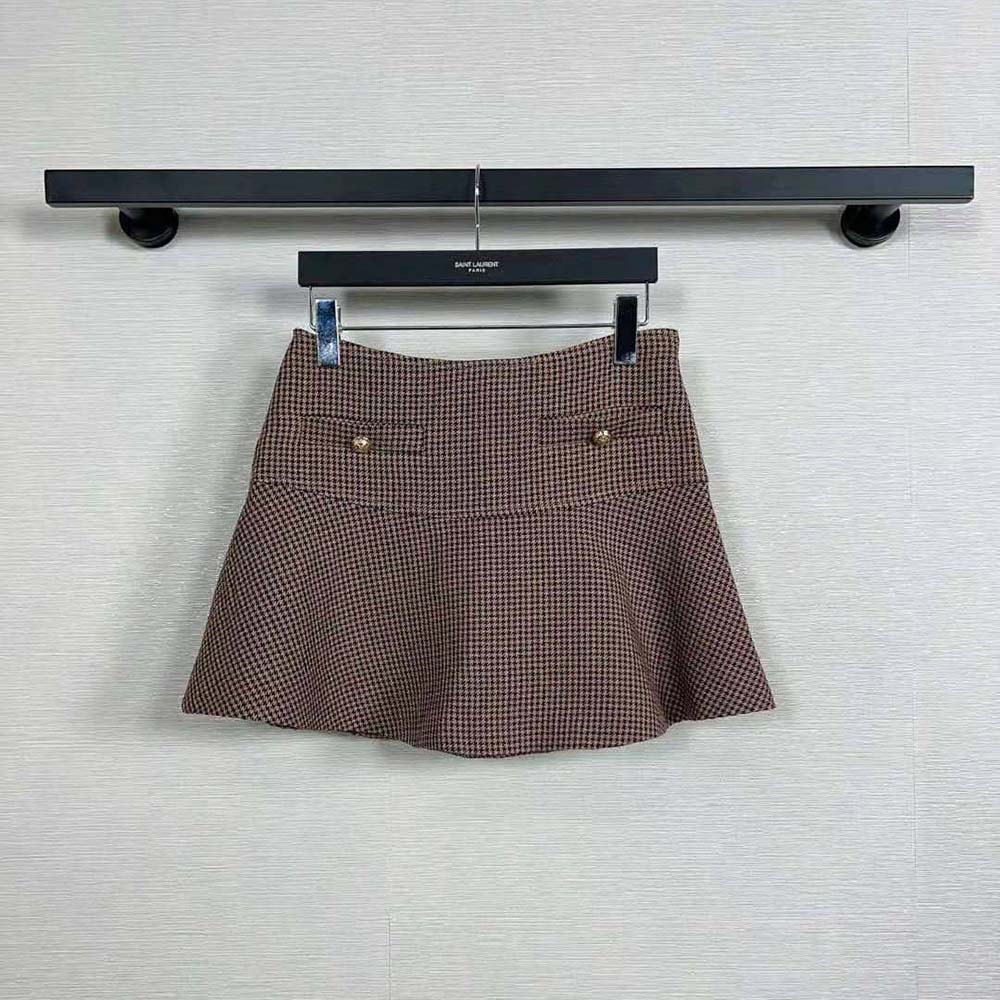 Close-up detail of brown double houndstooth pattern on Celine skirt