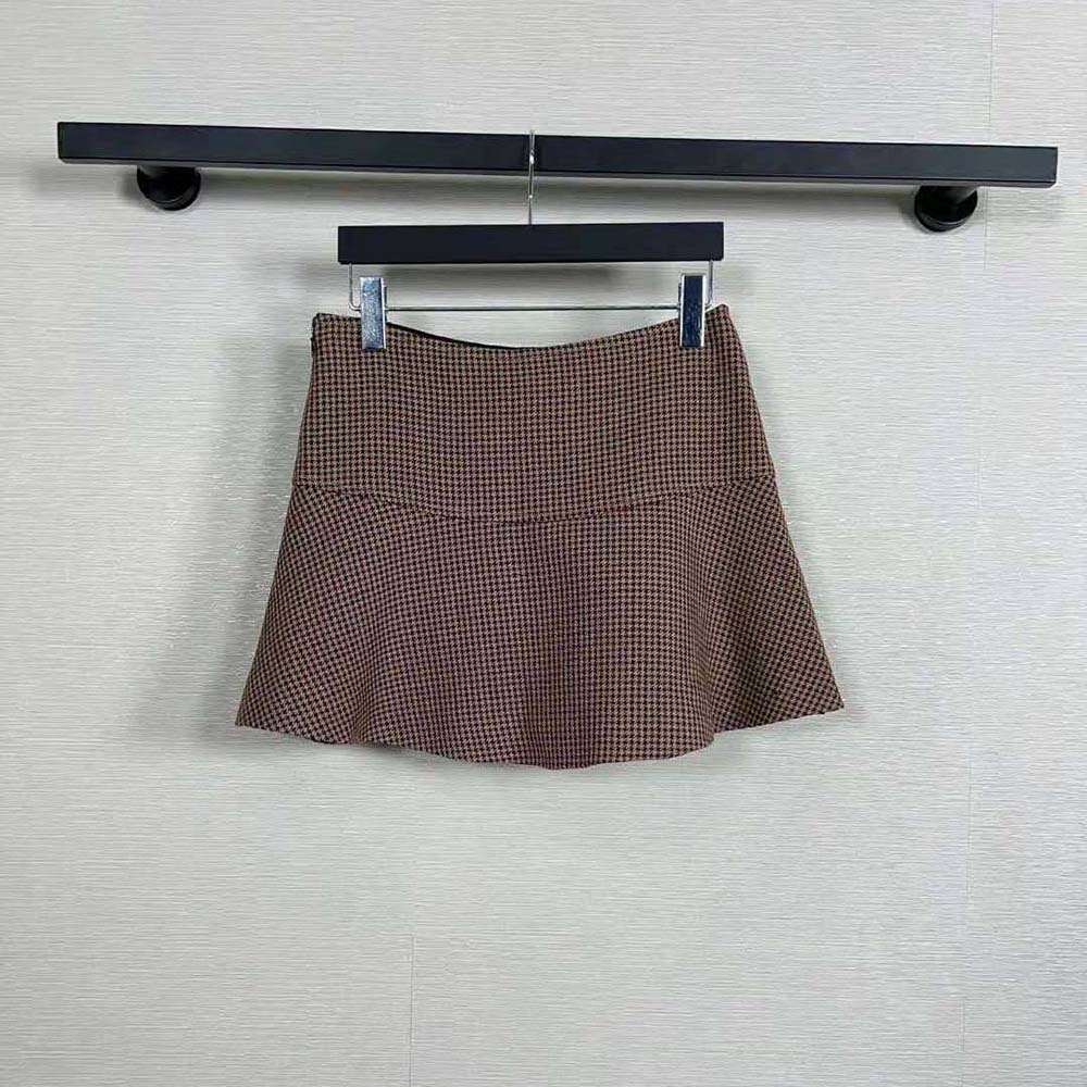 Side angle showing silhouette of Celine Women Mini Skirt in wool